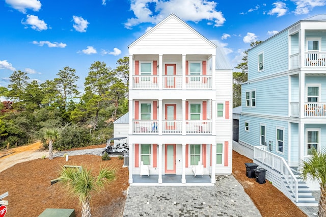 raised beach house with a balcony