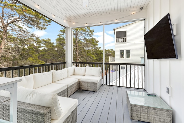 deck with an outdoor hangout area