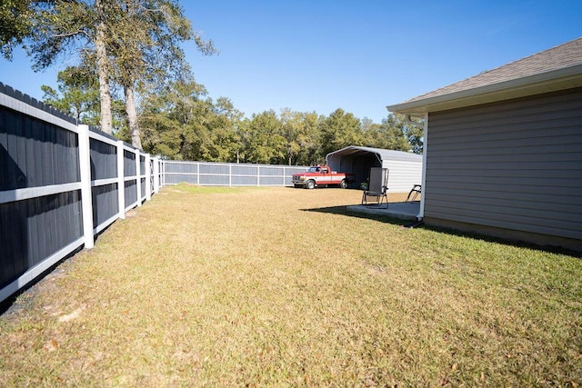 view of yard featuring a carport