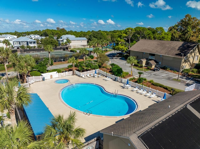 view of swimming pool featuring a patio area