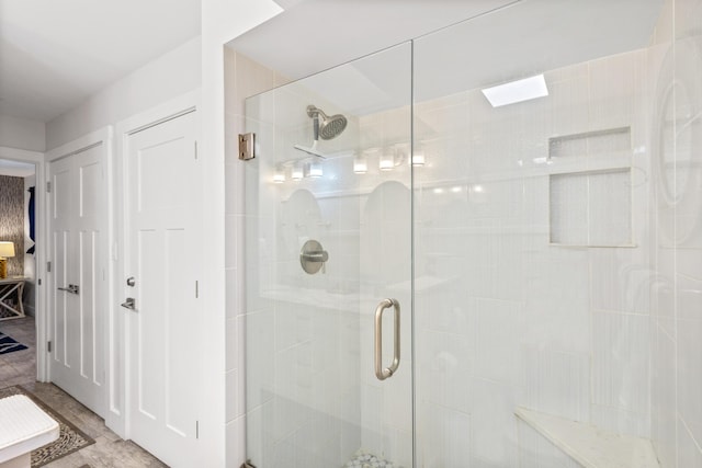 bathroom with an enclosed shower