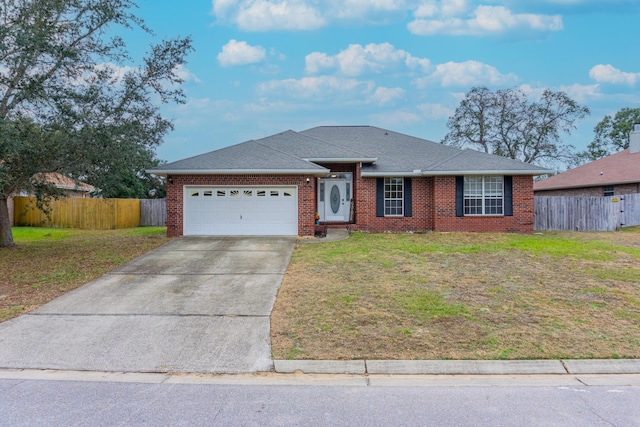 single story home with a front lawn and a garage