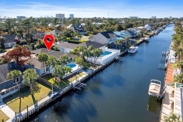 bird's eye view with a water view