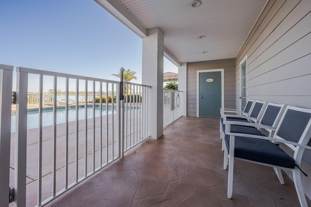 balcony featuring a patio area