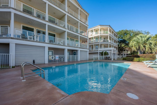 view of pool featuring a patio area