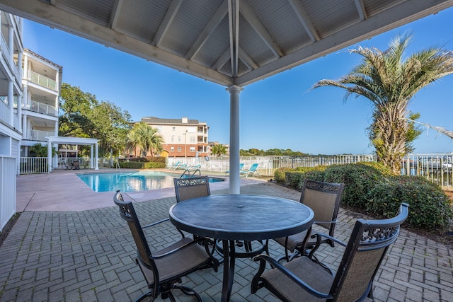 view of patio / terrace with a community pool