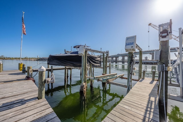 dock area featuring a water view