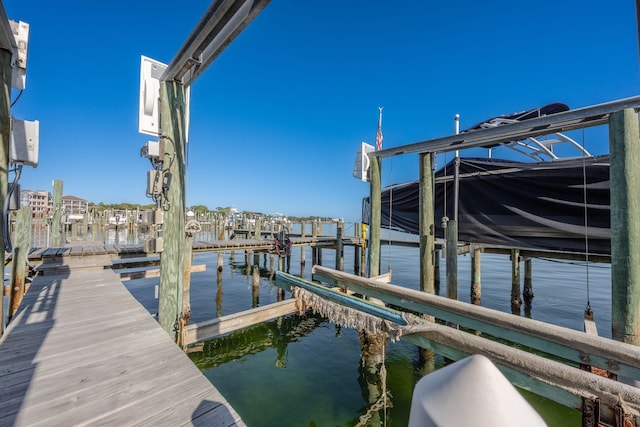 view of dock with a water view