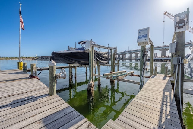 dock area with a water view