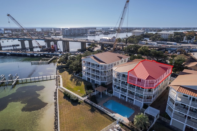 birds eye view of property with a water view