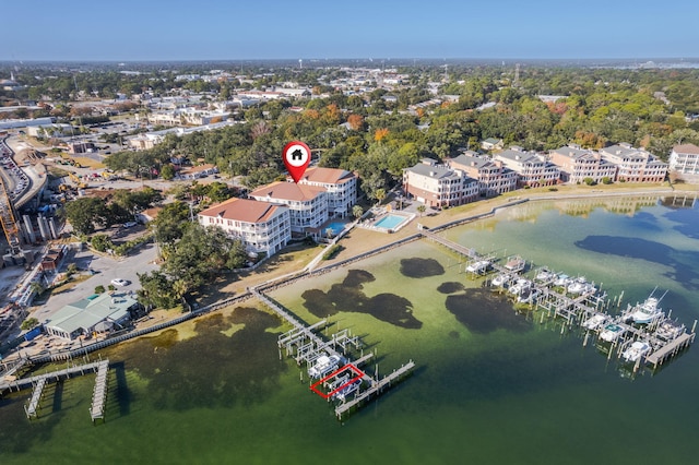 birds eye view of property with a water view