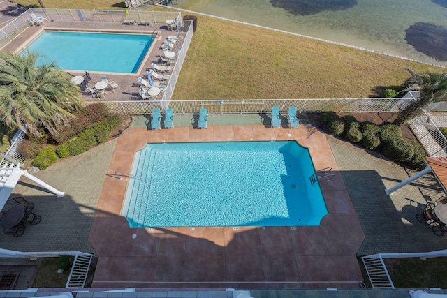 view of swimming pool featuring a patio area