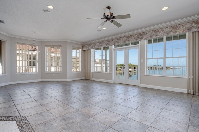 interior space featuring ceiling fan, french doors, a water view, and ornamental molding