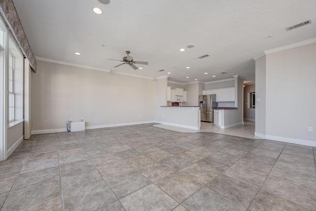 unfurnished living room featuring ceiling fan, crown molding, and a textured ceiling