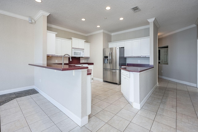 kitchen with white cabinetry, kitchen peninsula, stainless steel fridge with ice dispenser, and a textured ceiling