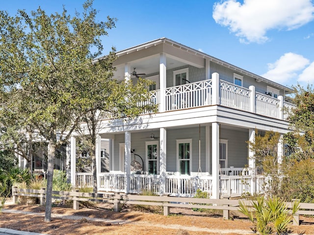 view of front of property with ceiling fan and covered porch