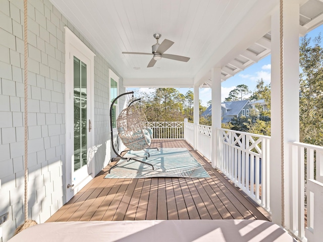 wooden terrace with ceiling fan