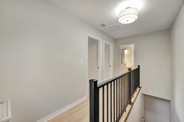 stairs featuring wood-type flooring