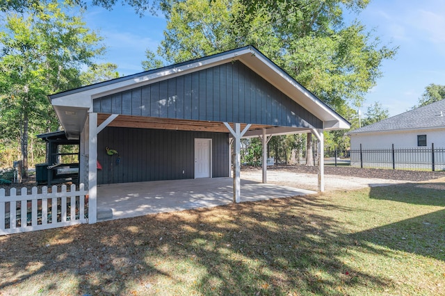 garage featuring a yard