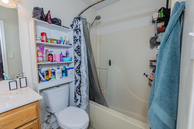 full bathroom with vanity, shower / bath combo, and toilet