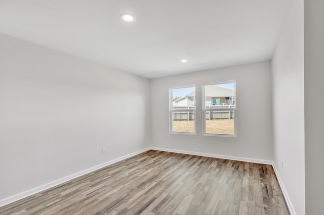 empty room featuring light hardwood / wood-style floors