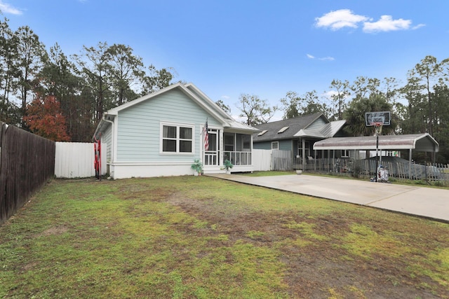 29 Santa Pine St, Santa Rosa Beach, FL 32459 - back of house featuring a sunroom and a yard