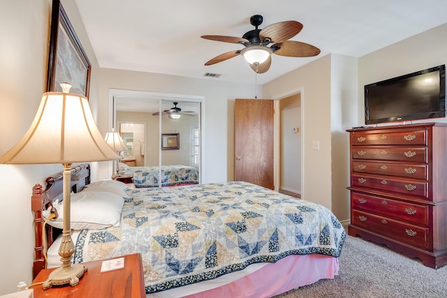 bedroom featuring carpet flooring, a closet, and ceiling fan