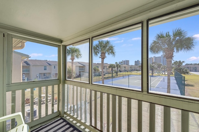 unfurnished sunroom with a healthy amount of sunlight