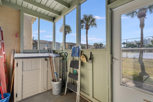 sunroom / solarium featuring a healthy amount of sunlight