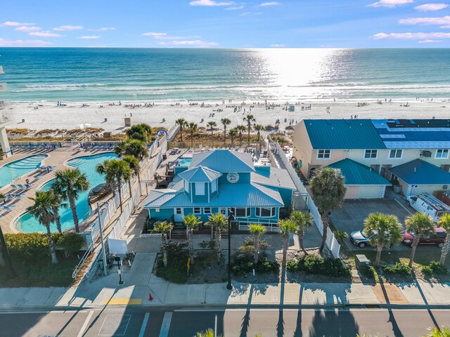 bird's eye view featuring a view of the beach and a water view