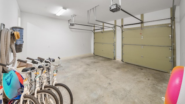 garage featuring a garage door opener