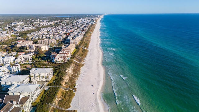 bird's eye view with a beach view and a water view