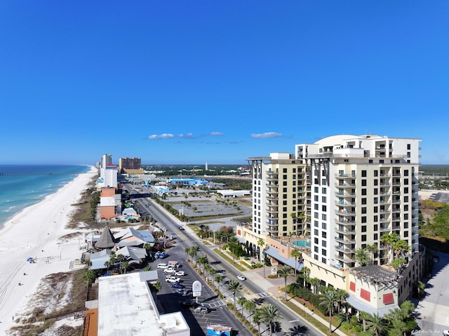 aerial view featuring a view of the beach and a water view