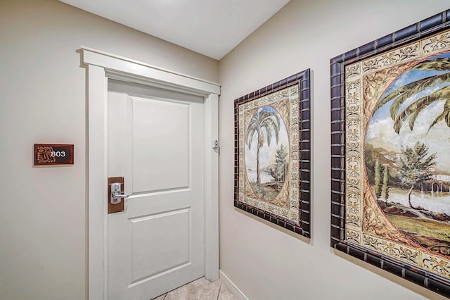 entryway featuring light tile patterned floors