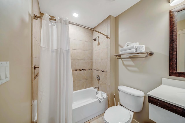 full bathroom with vanity, toilet, and shower / bath combo with shower curtain