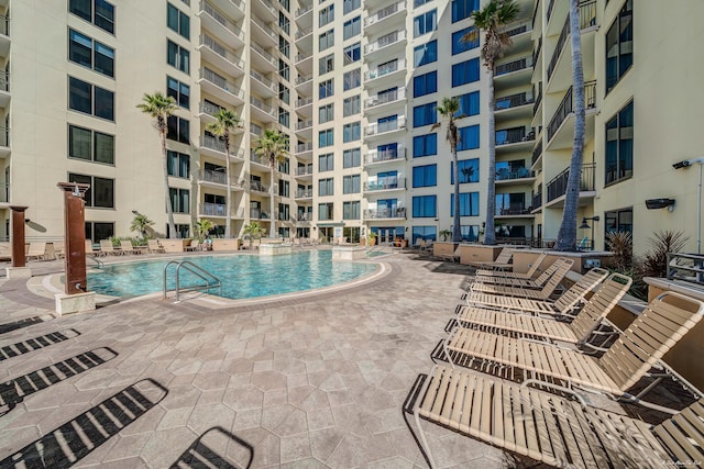 view of pool featuring a patio