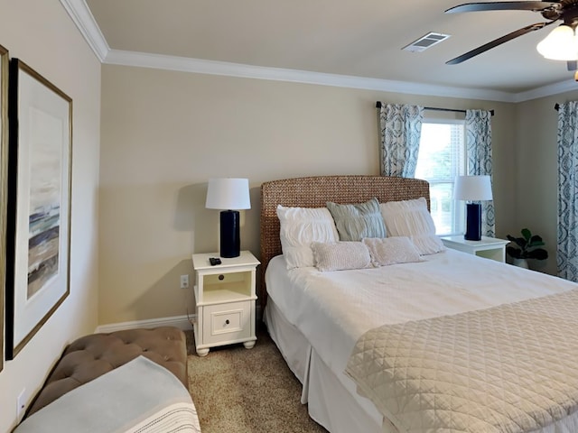 bedroom with light carpet, ceiling fan, and crown molding