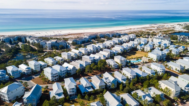 aerial view featuring a water view and a view of the beach