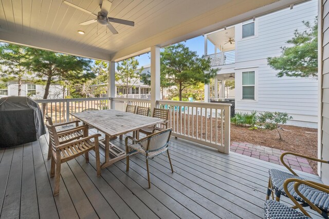 deck with ceiling fan and a grill