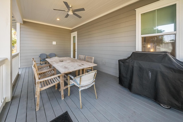 deck with ceiling fan and a grill