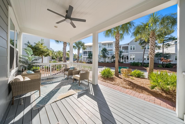 wooden deck with ceiling fan