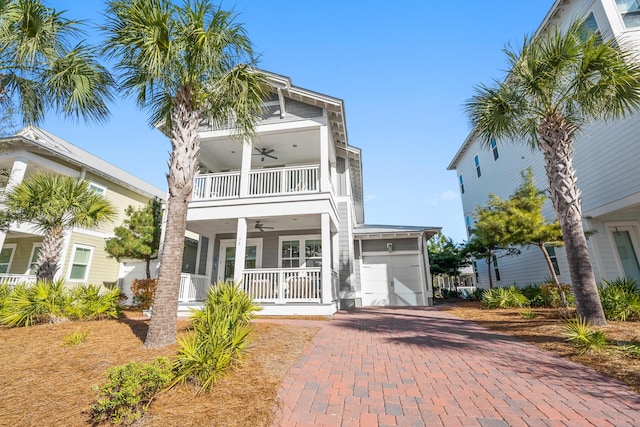 view of front of property featuring a porch, a balcony, and ceiling fan