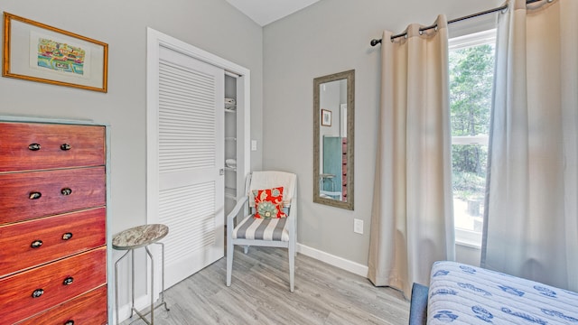 sitting room with light hardwood / wood-style flooring