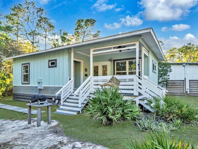 view of front of property with a front lawn and a porch