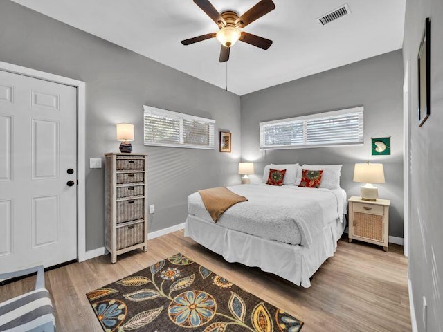 bedroom featuring ceiling fan and light hardwood / wood-style floors