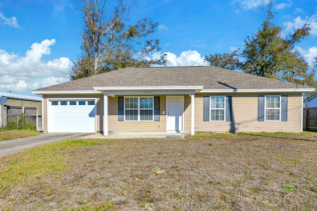 single story home with a garage and a front yard