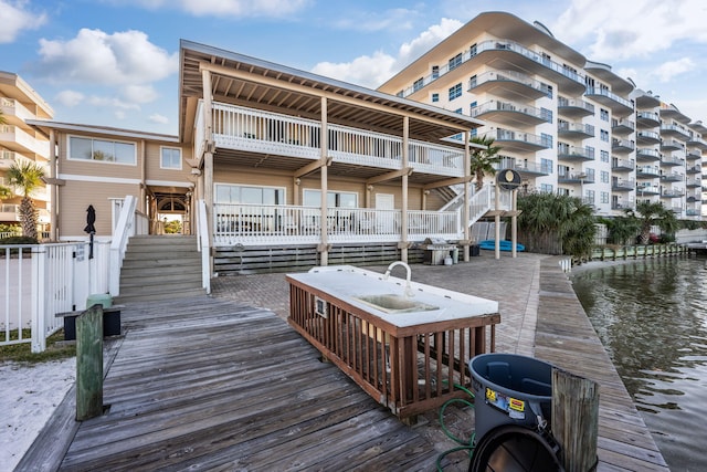 dock area with a water view