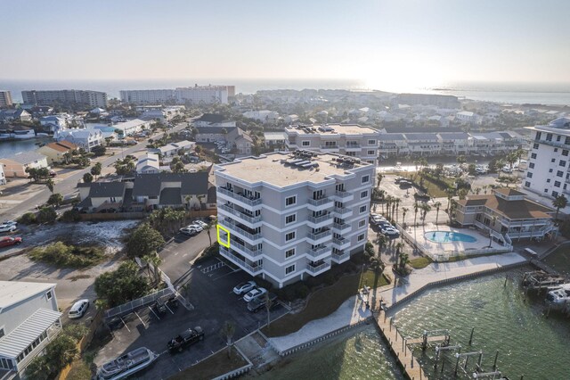 birds eye view of property featuring a water view