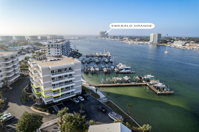 birds eye view of property with a water view