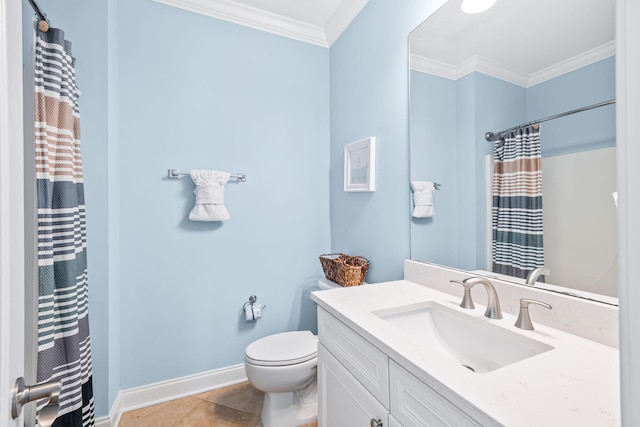 bathroom featuring toilet, ornamental molding, vanity, baseboards, and tile patterned floors